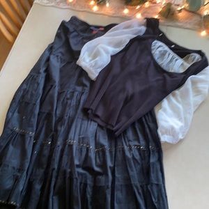 Black skirt along with black and white top